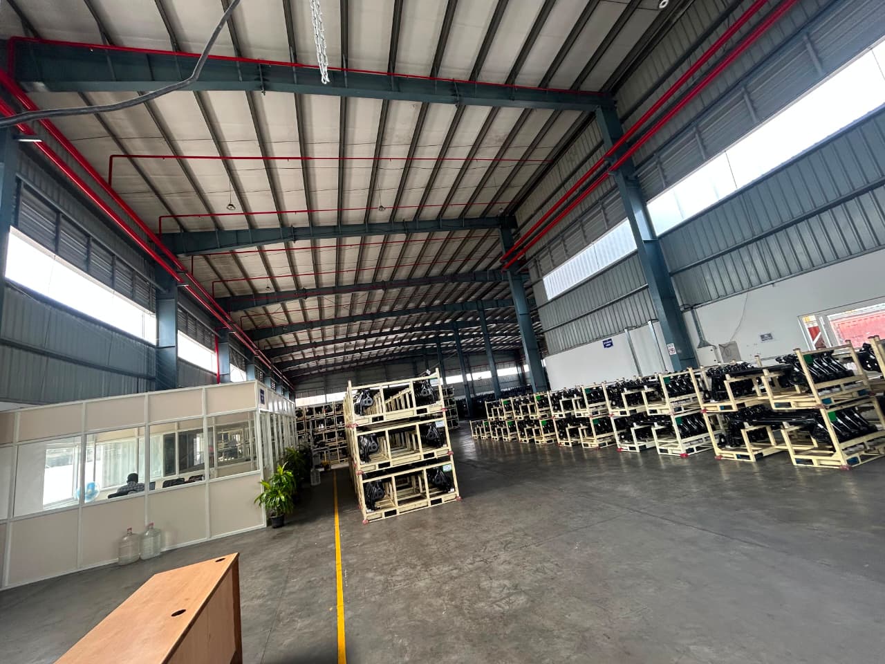 Original PCL warehouse photograph showing industrial storage space, handling racks and site office